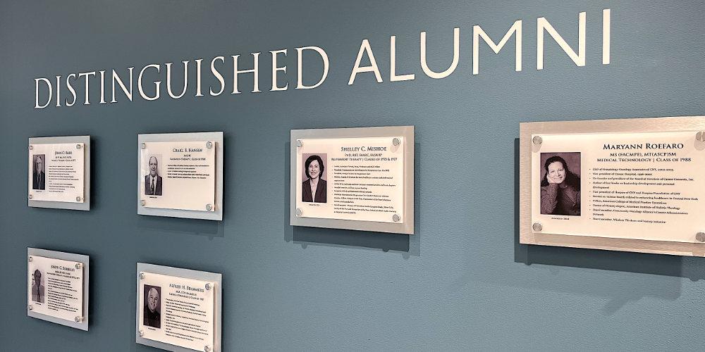 The Distinguished Alumni Wall in Sliverman Hall