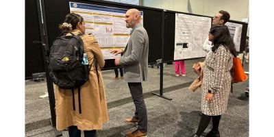 Justin presents a poster at AES 2022
