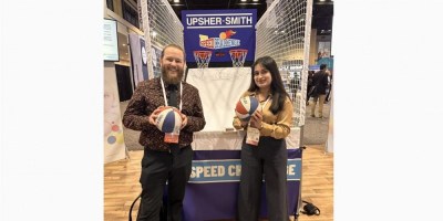 Kyle and Veronica show off their basketball skills at the 2023 American Epilepsy Society national meeting.