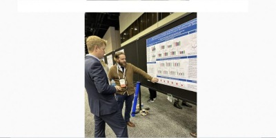 Kyle presents a poster at the 2023 American Epilepsy Society national meeting.