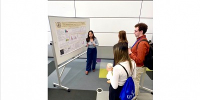 Veronica presenting her poster at the Charles Ross Memorial Student Research Day