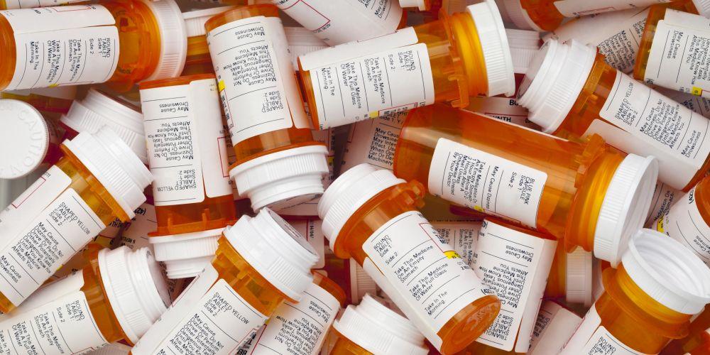 pile of prescription pills bottles